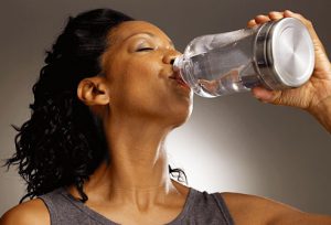 getty_rf_photo_african_american_woman_drinking_water