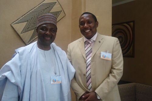 Mr.Richard_kasesela_with_former_Nigerian_President_Yakub_Gowon_during_the_Friends_of_Global_fund_Africa_meeting_in_Kigali