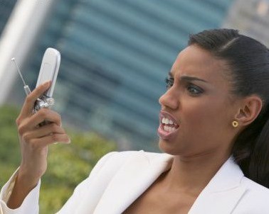 black-woman-looking-at-cell-phone-bossip-com-378x302