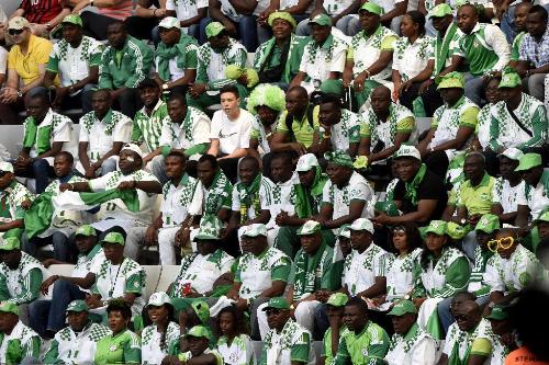 Nigeria's fans watch the Group F football match between Iran and Nigeria at the Baixada Arena in Curitiba at the 2014 FIFA World Cup on June 16, 2014. AFP PHOTO / JUAN BARRETOJUAN BARRETO/AFP/Getty Images