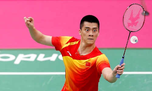China's Yun Cai and Fu Haifeng (pictured) play against Australia's Ross Smith and Glenn Warfe during their men's doubles group play stage badminton match at the Wembley Arena during the London 2012 Olympic Games July 28, 2012. REUTERS/Bazuki Muhammad (BRITAIN - Tags: SPORT BADMINTON SPORT OLYMPICS TPX IMAGES OF THE DAY)