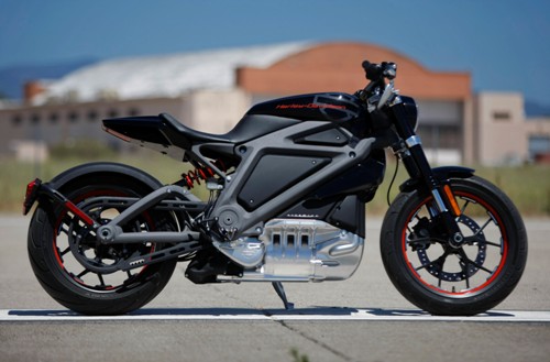 JUNE 17 2014. IRVINE, CA. "Live Wire", a prototype all electric motorcycle by Harley Davidson is unveiled to the media on the tarmac at the former Marine Corps Air Station El Toro in Irvine, CA, on June 17, 2014. The battery gives it a range of about 60 miles with a full recharge of 3 hours. The stripped down, full size, high-performance road bike can accelerate from 0-60 in 4 just seconds, but without the thunderous exhaust roar of a "Hog". A designer on hand for the rollout described its tone like that of a jet - a little jet. (Don Bartletti / Los Angeles Times)