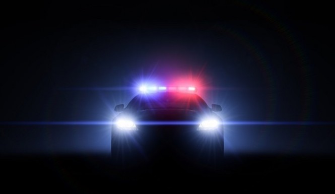 police-car-at-night-flashing-lights-Shutterstock-665x385