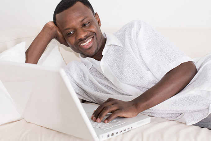 black-man-with-computer